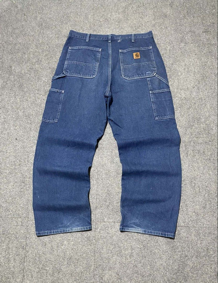 Carhartt B13 DST CARPENTER PANTS (Category: Jeans) located in Santa Rosa. Submitted by cenchpro (Listing ID 1462699586, Image 1). Description: B13 DST 35x39x9.5 (denim) Good Condition Issue: Sign of Usage and Distressed (patched na ung hole sa likod na part) .