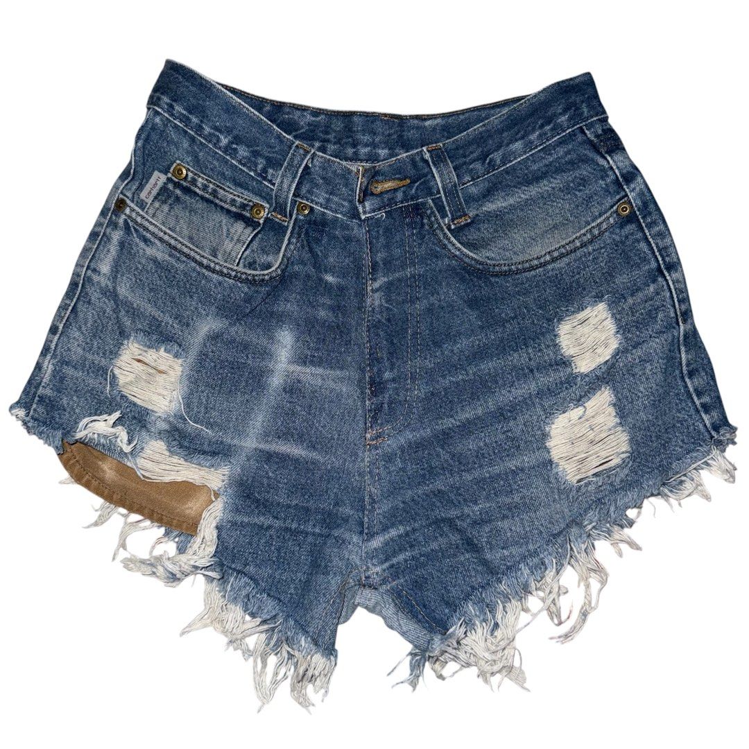 Carhartt Distressed Denim Cutoff Shorts (Category: Shorts) located in San Narciso. Submitted by angels.attic21 (Listing ID 1462704905, Image 1). Description: - Vintage Carhartt denim shorts - Size 28-30 inches waist - High-waisted style - Distressed, cutoff look - Frayed hem and ripped details - Classic Carhartt patch on back pocket - Unique piece with character - Perfect for a casual, edgy vibe.