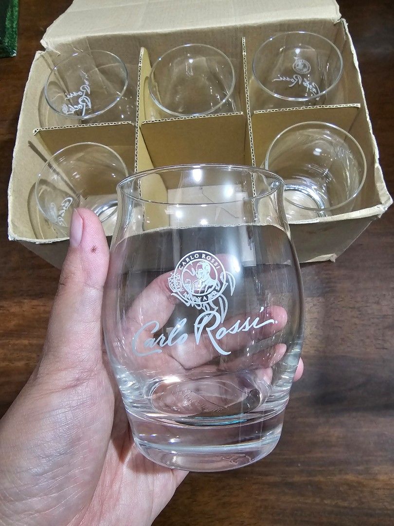 SALE❗CARLO ROSSI Rock Glasses - 6 pcs (Category: Dinnerware & Cutlery) located in Quezon City. Submitted by senyoramaria (Listing ID 1462881013, Image 1). Description: CARLO ROSSI Rounded glasses with back to back logo / print. Can be used for wide range of drinks - wine, whisky, cocktails, juice etc. 2.6 inches rim diameter 4 inches tall 6 pcs per box 2 boxes available *Damaged lang ung box nung isa. Php1200❗.