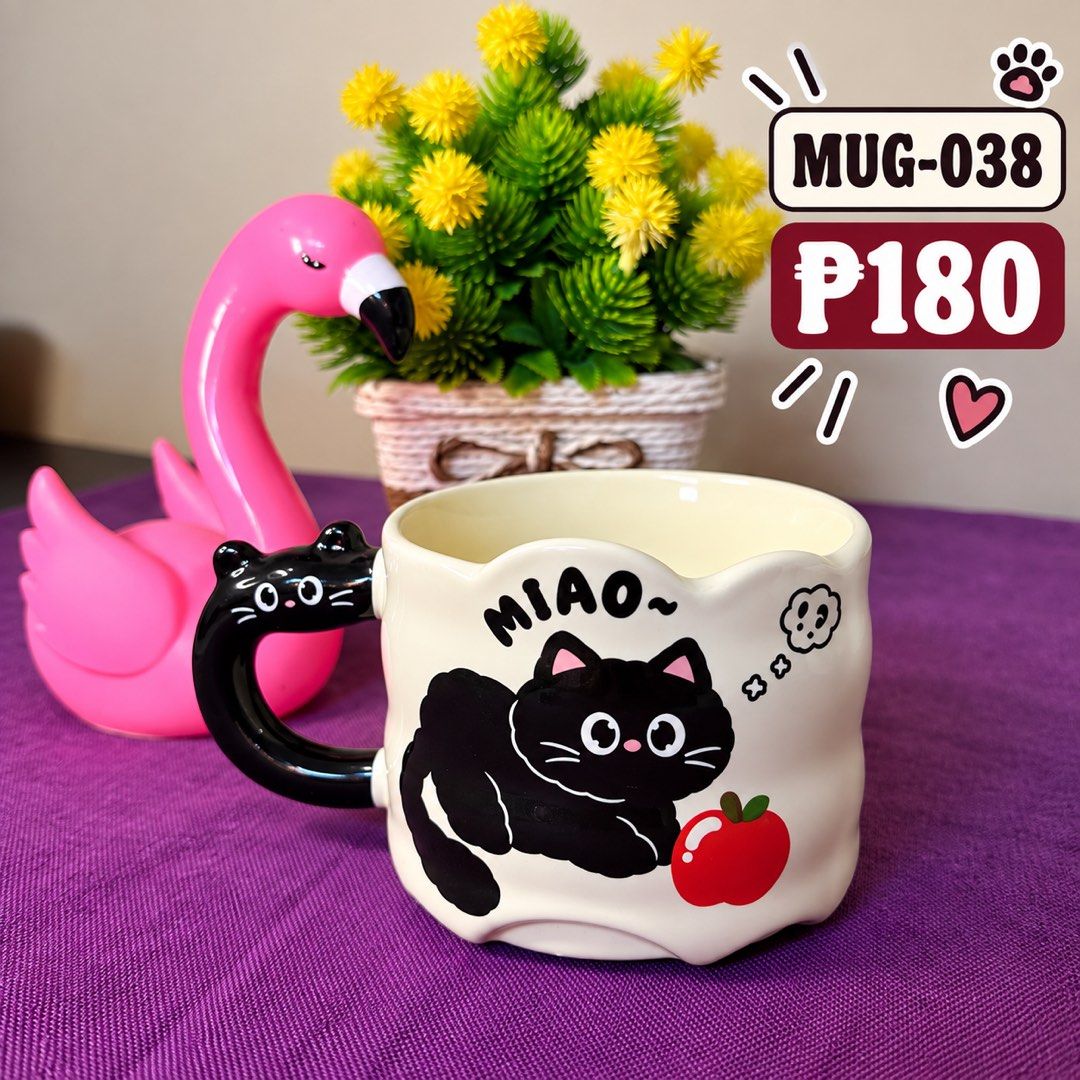 CARTOON CERAMIC MUGS (Category: Water Bottles & Tumblers) located in Manila. Submitted by zamarah08 (Listing ID 1462684833, Image 3). Description: ❤️❤️🍓🍓🍓 - Adorable cartoon ceramic mug - Features a cute black cat design - Unique and stylish handle - Perfect for hot or cold beverages - Ideal for personal use or as a gift Pm me 🍓🍓🍓🍓❤️❤️❤️.