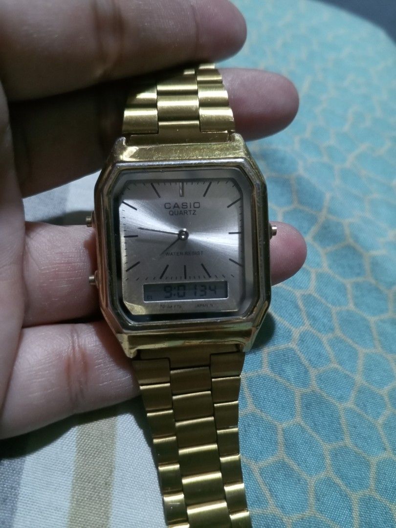 Casio AQ-230 Gold Analog Digital Watch (Category: Men's Watches) located in Magalang. Submitted by zeiansoria64090 (Listing ID 1462784897, Image 1). Description: - Classic retro gold Casio watch - declare as is - Analog and digital display - Water resistant - Stainless steel back - Made in Japan - Perfect for everyday wear - Displays time and date.