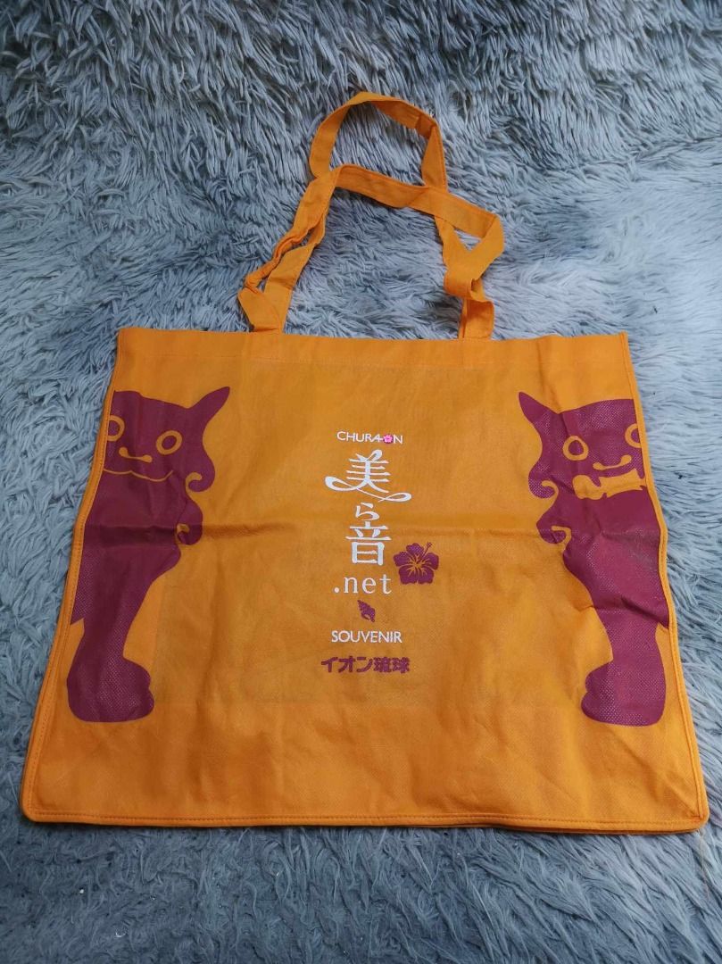 Cat Stylized Orange Shopper Bag (Category: Tote Bags) located in Santa Cruz. Submitted by jmy_surplus.2 (Listing ID 1462790133, Image 2). Description: Size ; L - 15.6 W - 18 Color ; Orange Type ; Tote Bag Brand ; No brand Material ; Synthetic Style ; Orange Durable Shopper Bag LR 129 JMY 5 Batch #222.