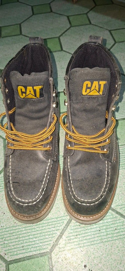 CAT Work Boots, Vans, Nike Kyrie (Category: Boots) located in Valenzuela. Submitted by thriftlets (Listing ID 1462808466, Image 1). Description: For Sale! CAT Work Boots, Vans, Nike Kyrie 750 each Loc. Valenzuela.
