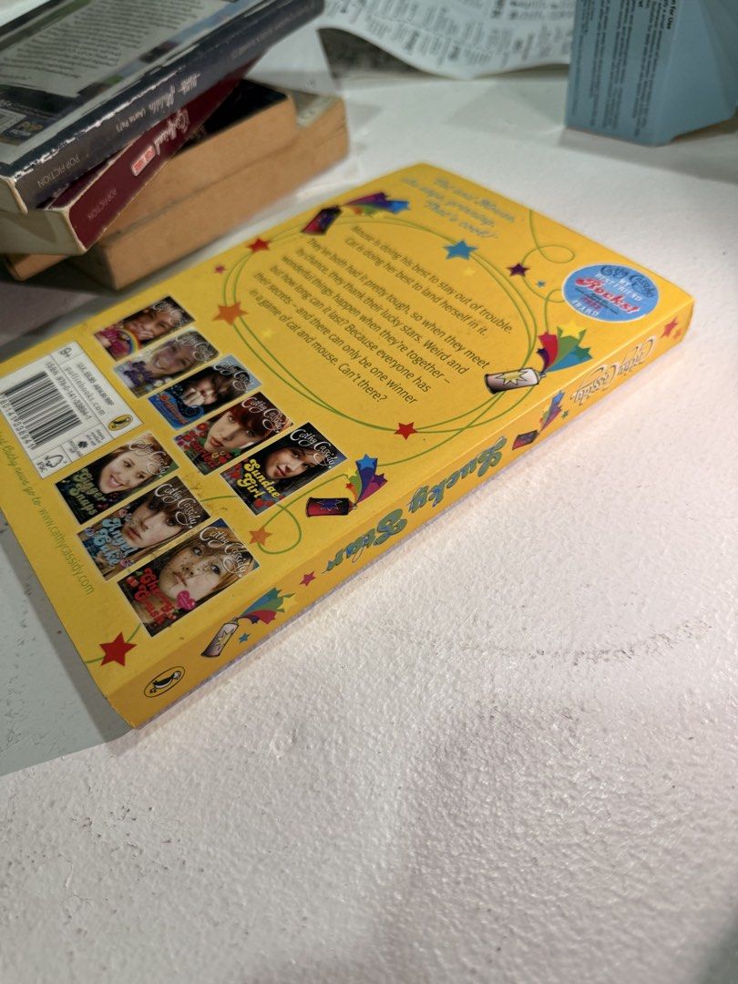 Cathy Cassidy Lucky Star Book (Category: Storybooks) located in Naga. Submitted by elaniaa (Listing ID 1462789875, Image 3). Description: - Title: Lucky Star - Author: Cathy Cassidy - Series: Best Friend Rocks! - Genre: Young Adult Fiction - Plot: Follows Cat and Mouse as they uncover each other's secrets. - Recommended for: Readers who enjoy stories about friendship and mystery..