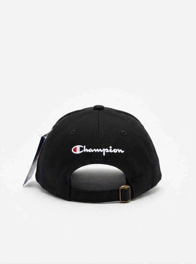 Champion Black Dad Cap Baseball Hat (Category: Caps & Hats) located in Manila. Submitted by kid.indigo (Listing ID 1462708685, Image 2). Description: - Classic black Champion cap - Iconic C logo on the front - Embroidered 'Champion' text on the back - Adjustable strap for a comfortable fit - Made in China - Ideal for everyday wear.