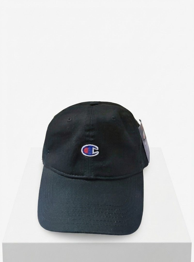 Champion Black Dad Cap Baseball Hat (Category: Caps & Hats) located in Manila. Submitted by kid.indigo (Listing ID 1462708685, Image 1). Description: - Classic black Champion cap - Iconic C logo on the front - Embroidered 'Champion' text on the back - Adjustable strap for a comfortable fit - Made in China - Ideal for everyday wear.