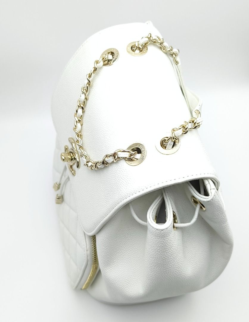 Chanel Business Affinity Backpack - Small White Caviar (Category: Luxury Bags & Wallets) located in Cebu City. Submitted by theluxxaffair (Listing ID 1462769183, Image 2). Description: Chanel Business Affinity Backpack in white quilted grained caviar leather. Features the classic interlocking CC turn-lock closure, front double-zipped compartment, gold-tone hardware, and iconic leather-intertwined chain straps. Spacious main compartment with cinch