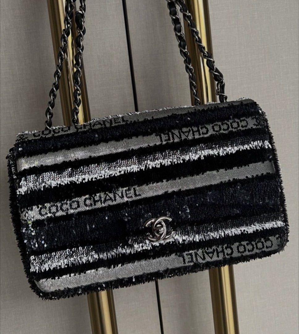 Chanel flap rare sequins (Category: Luxury Bags & Wallets) located in Silang. Submitted by girlyouneedthis (Listing ID 1462785527, Image 1). Description: This beautiful rare Chanel sequins bag is carefully crafted to mimic the illusion of tweed. Leather interior, plated, microchipped, comes with dustbag only. Can be sling bag and a crossbody bag. No returns, No exchange, No refunds..