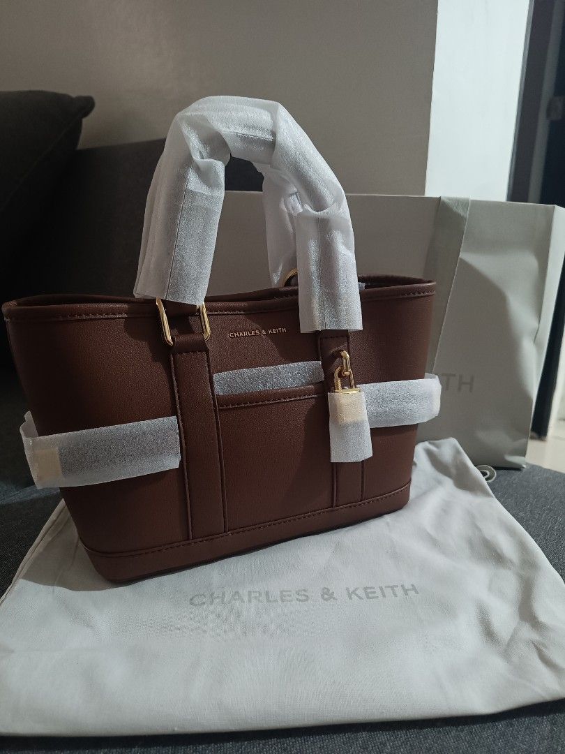 Charles & Keith (Category: Luxury Bags & Wallets) located in Manila. Submitted by wisefire.7687ba (Listing ID 1462769992, Image 1). Description: brand new and complete with paper bag and dust bag. with receipt buy it at glorietta.