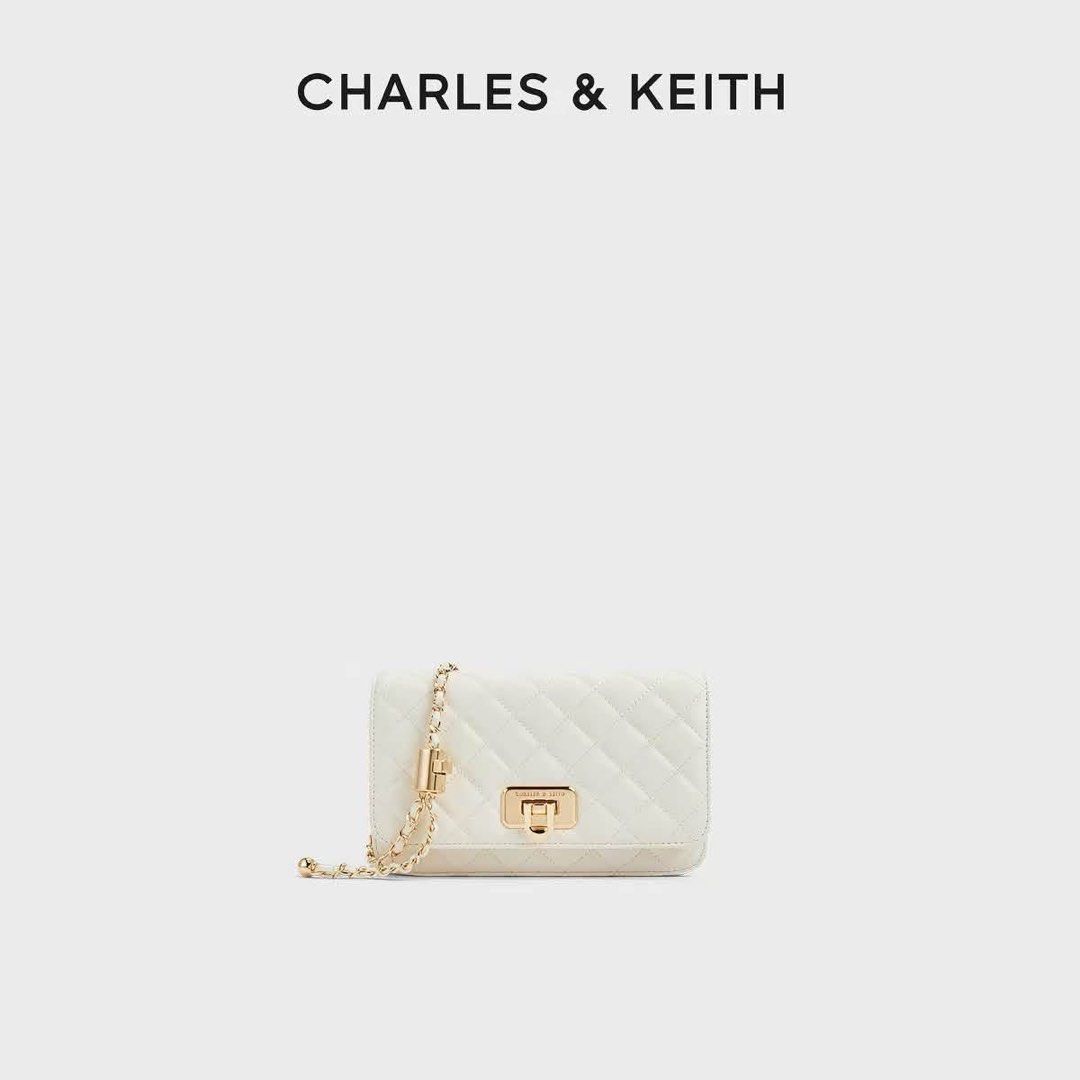 Charles & Keith Cressida Quilted Push-Lock Clutch (Category: Clutches) located in Manila. Submitted by chic.collectivemnl (Listing ID 1462827969, Image 3). Description: .