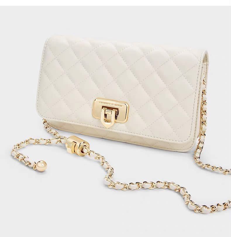 Charles & Keith Cressida Quilted Push-Lock Clutch (Category: Clutches) located in Manila. Submitted by chic.collectivemnl (Listing ID 1462827969, Image 1). Description: .