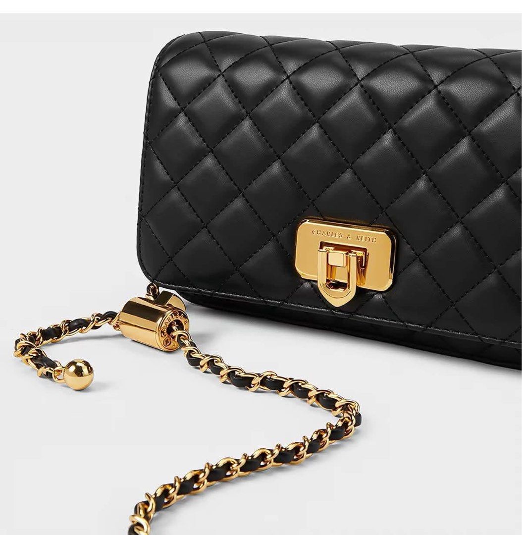 Charles & Keith Cressida Quilted Push-Lock Clutch (Category: Clutches) located in Manila. Submitted by chic.collectivemnl (Listing ID 1462827969, Image 2). Description: .