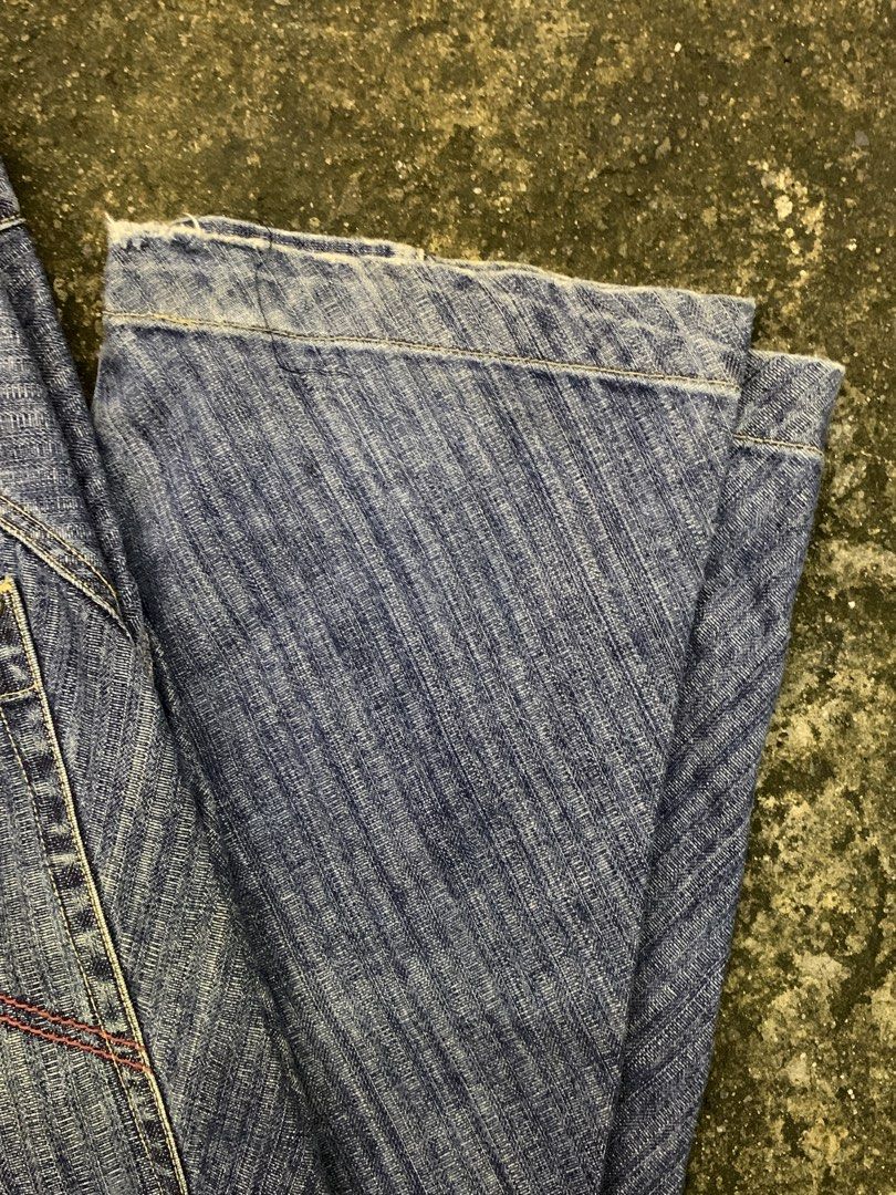 Chevignon Authentic 100% Cotton Denim Jeans (Category: Jeans) located in Manila. Submitted by thrift2mnla (Listing ID 1462812758, Image 2). Description: - Classic blue denim jeans from Chevignon - Made with 100% cotton for ultimate comfort - Unique diagonal seam detail down the legs - Distinctive red stitching on the back pocket - Relaxed fit, perfect for everyday casual wear.