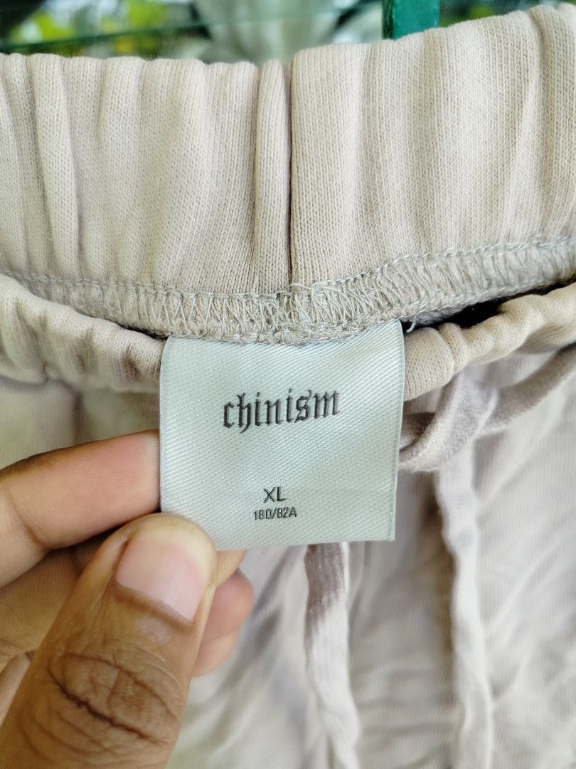 Chinism Beige Cotton Drawstring Shorts XL (Category: Activewear) located in Manila. Submitted by virgiliosa38485 (Listing ID 1462840451, Image 3). Description: - Brand: Chinism - Color: Beige - Material: 100% Cotton - Features: Drawstring waist, elastic waistband, back pocket - Detail: Small logo on front - Style: Casual wear.
