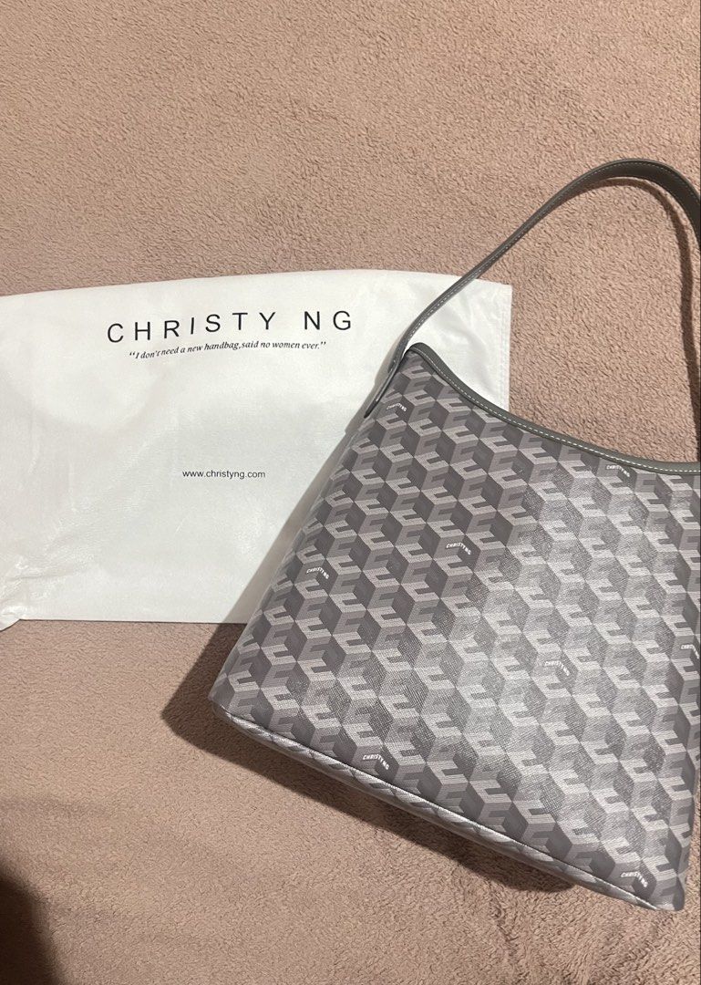 Christy Ng Alesso Medium Hobo Bag (Category: Shoulder Bags) located in Baguio. Submitted by mikachuuu368 (Listing ID 1462831775, Image 1). Description: Christy Ng Alesso Medium Hobo Bag • Color: Ash (kindaa grayy) • Never been used — comes with dust bag! • Original Price: ₱3499 • Coated canvas and other materials: Ensures durability and style. • Magnetic button closure: For secure storage. • 1 compartment & 1 zip pocket: Keep your items organized