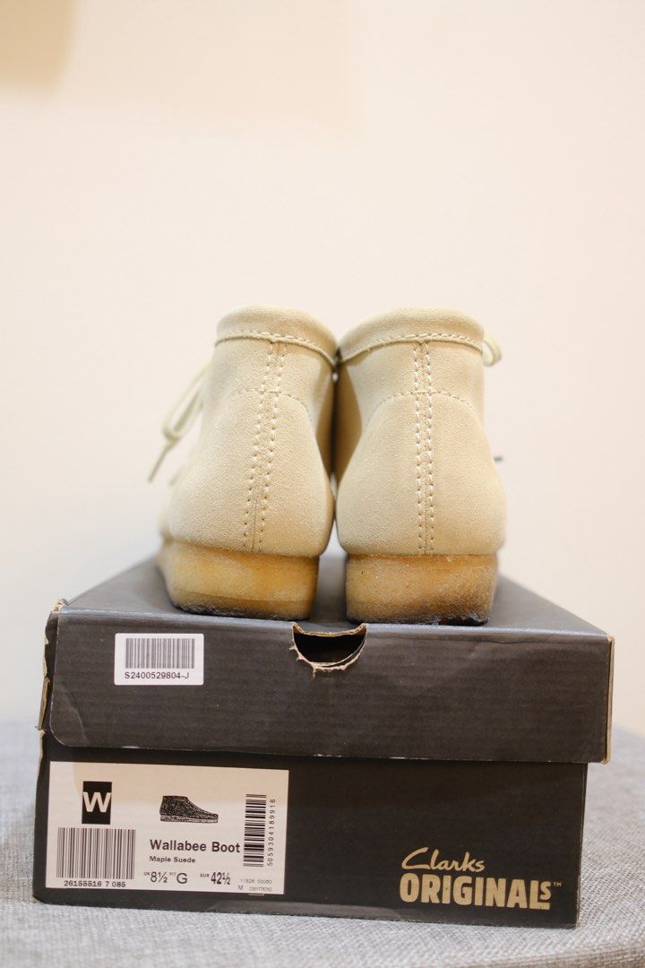 Clarks Wallabee Boot Maple Suede (Category: Boots) located in Manila. Submitted by gsa86 (Listing ID 1462814432, Image 2). Description: - Clarks Wallabee Boots - Color: Maple Suede - Size: UK 8.5G / EUR 42.5 - Style: Classic moccasin construction - Sole: Crepe sole - Condition: Comes with original box - Versatility: Perfect addition to any wardrobe - used 4x.