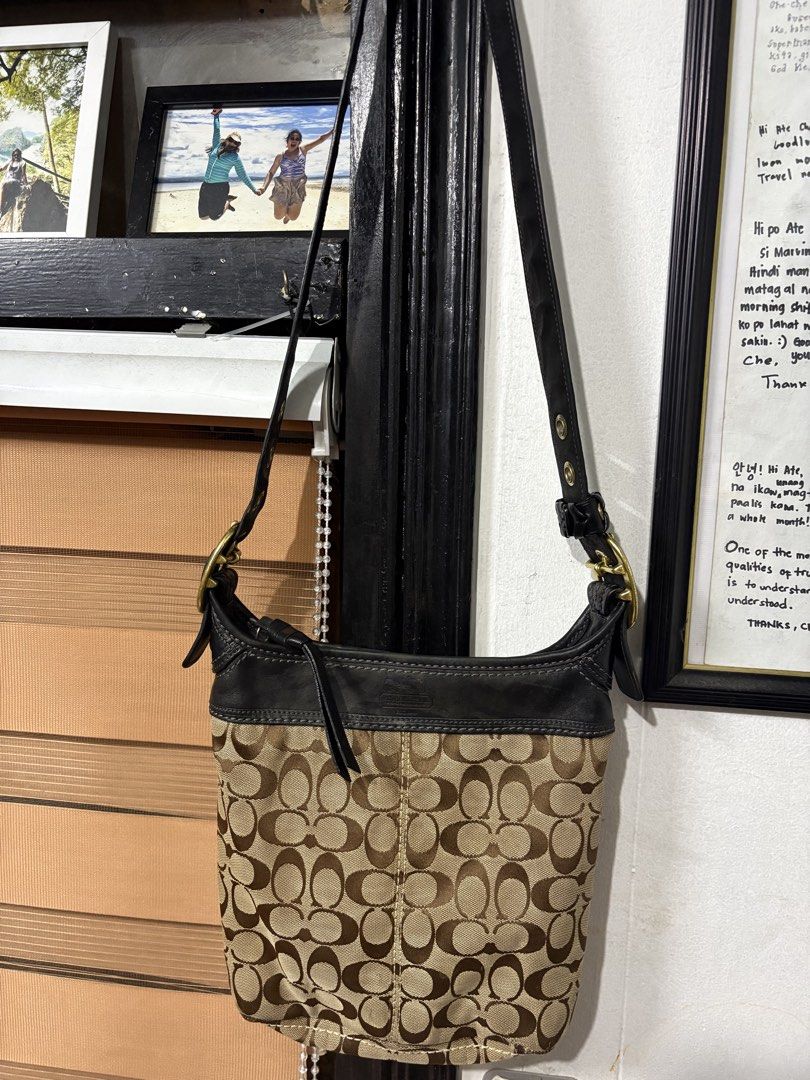 Coach Bleecker Monogram Canvas (Category: Luxury Bags & Wallets) located in Makati City. Submitted by cherriesforme (Listing ID 1462741512, Image 1). Description: - Classic Coach bag - Signature monogram canvas with black leather trim - Gold hardware details - Zipper closure - Interior zip pocket and slip pockets - Great everyday bag Kindly see last photo for stains inside.