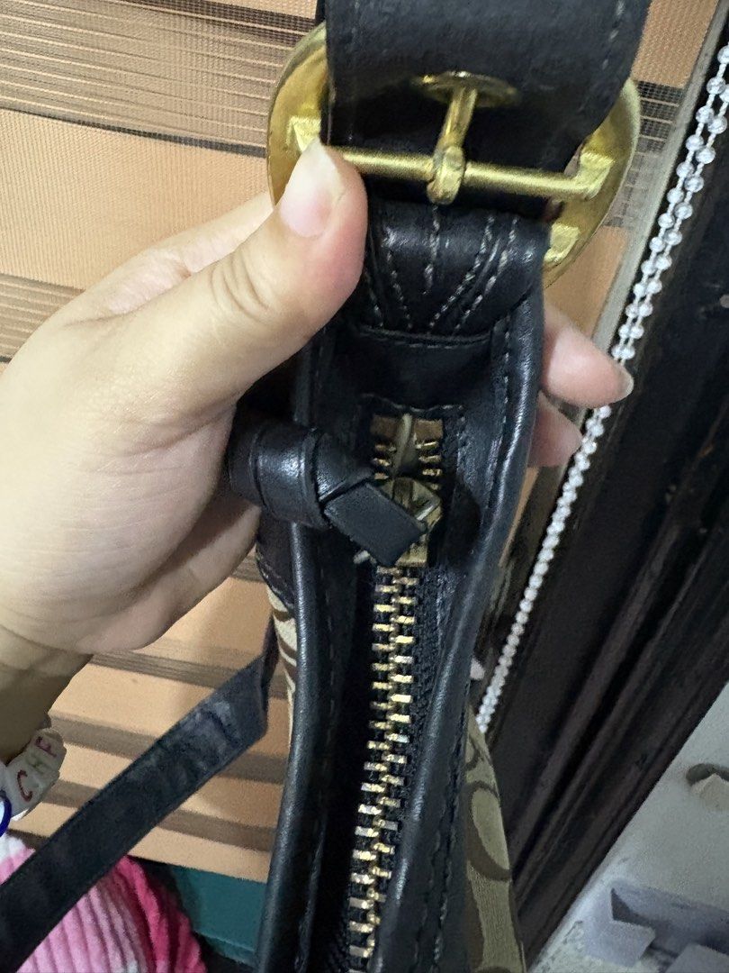 Coach Bleecker Monogram Canvas (Category: Luxury Bags & Wallets) located in Makati City. Submitted by cherriesforme (Listing ID 1462741512, Image 3). Description: - Classic Coach bag - Signature monogram canvas with black leather trim - Gold hardware details - Zipper closure - Interior zip pocket and slip pockets - Great everyday bag Kindly see last photo for stains inside.