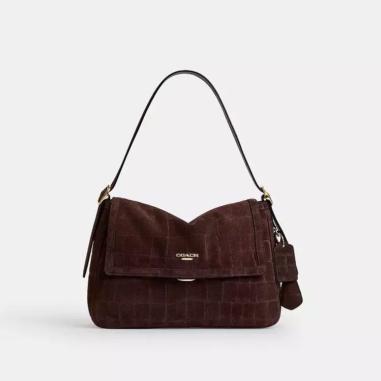 Coach Etta Flap Bag in Crocodile-Embossed Suede 💖 (Category: Shoulder Bags) located in Manila. Submitted by the.real.love.elle (Listing ID 1462682594, Image 2). Description: ✈️ 2-6 weeks ETA 🚢 2-3 months ETA 🛒 Pre order 💌 DM for inquiries and orders Love, Elle is not affiliated with the brands mentioned. All rights and trademarks are the property of their respective owners. No sponsorship, endorsement, or property infringement is intended; al