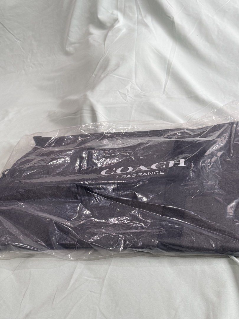 Coach Fragrance Duffel Bag (Category: Sling Bags) located in Manila. Submitted by purplebunnie1 (Listing ID 1462767438, Image 1). Description: - Coach dark grey duffel bag - Zippered main compartment - Two top handles - Zipper pull features Coach logo - Ideal for travel or gym use -Felt Texture.