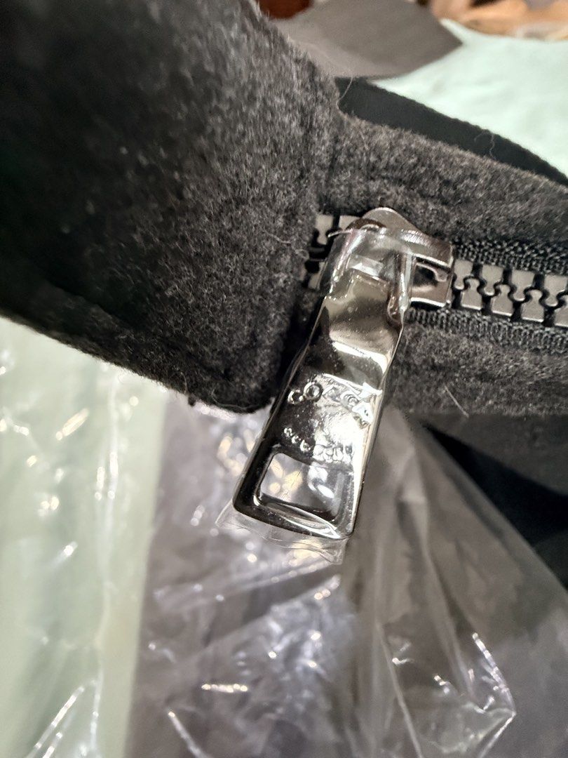 Coach Fragrance Duffel Bag (Category: Sling Bags) located in Manila. Submitted by purplebunnie1 (Listing ID 1462767438, Image 2). Description: - Coach dark grey duffel bag - Zippered main compartment - Two top handles - Zipper pull features Coach logo - Ideal for travel or gym use -Felt Texture.