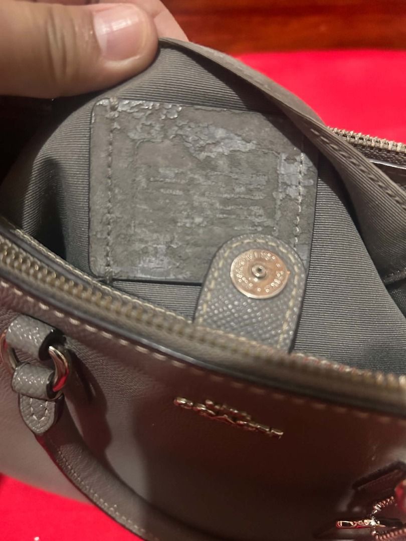 Coach Grey Leather Satchel Handbag (Category: Luxury Bags & Wallets) located in Valenzuela. Submitted by sv072724 (Listing ID 1462741543, Image 2). Description: - Coach grey leather satchel bag - Main zip compartment - Inner zip pocket - Detachable strap - Perfect size for everyday use - Interior leather tag shows some wear Flaws seen on the picture .