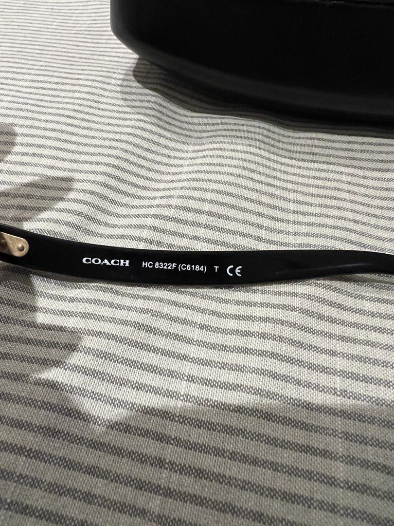 Coach HC 8322F Sunglasses with Case (Category: Sunglasses & Eyewear) located in Marikina City. Submitted by patrickmontojo.ramos (Listing ID 1462782756, Image 2). Description: - Authentic Coach Sunglasses - Model: HC 8322F - Stylish chain detail on arms - Lens Width: 56mm - Bridge Width: 17mm - Temple Length: 140mm - Includes original Coach hard case.