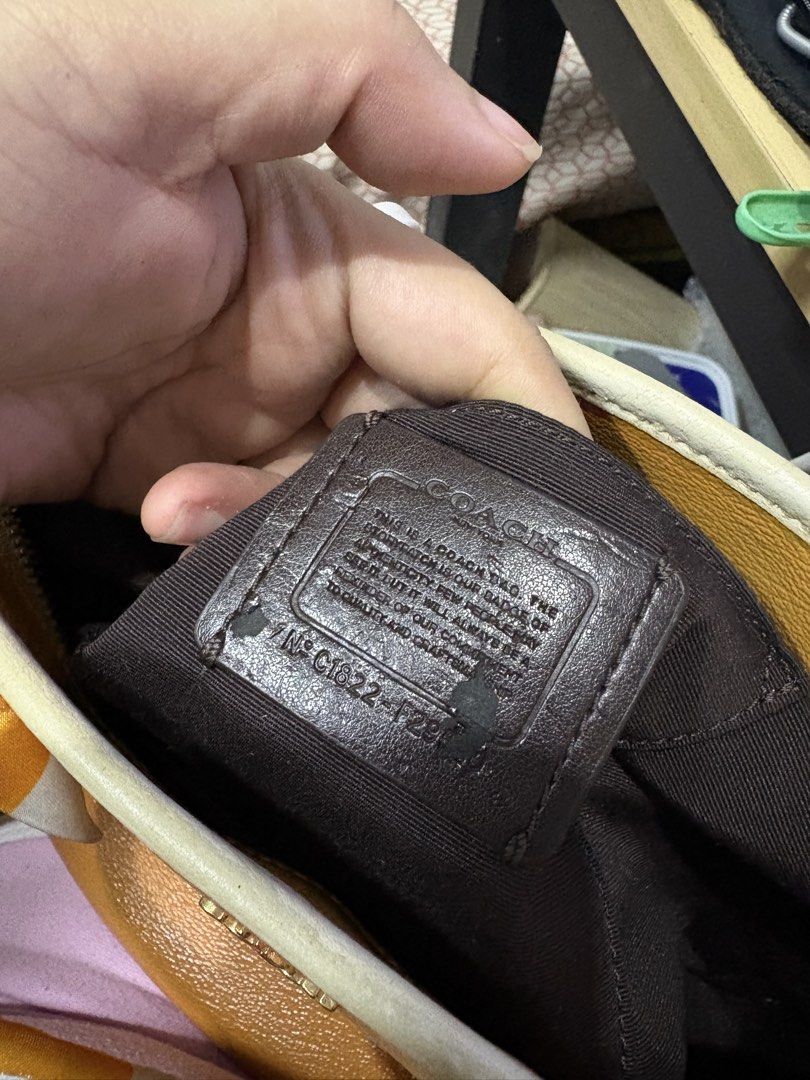 Coach Leather Tote Bag (Category: Tote Bags) located in Makati City. Submitted by cherriesforme (Listing ID 1462745770, Image 3). Description: - Authentic Coach leather tote bag - Secure zipper closure - Spacious interior - Includes Coach authenticity tag - Label indicates 'Made in Cambodia' - Ideal for carrying all your daily essentials.
