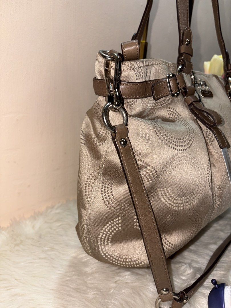 Coach Madison Dotted op art Caryall (Category: Luxury Bags & Wallets) located in Angeles City. Submitted by azter.archive (Listing ID 1462879513, Image 2). Description: Like new, clean, no issue Extra shoulder strap included Large size cross posted on my IG account.