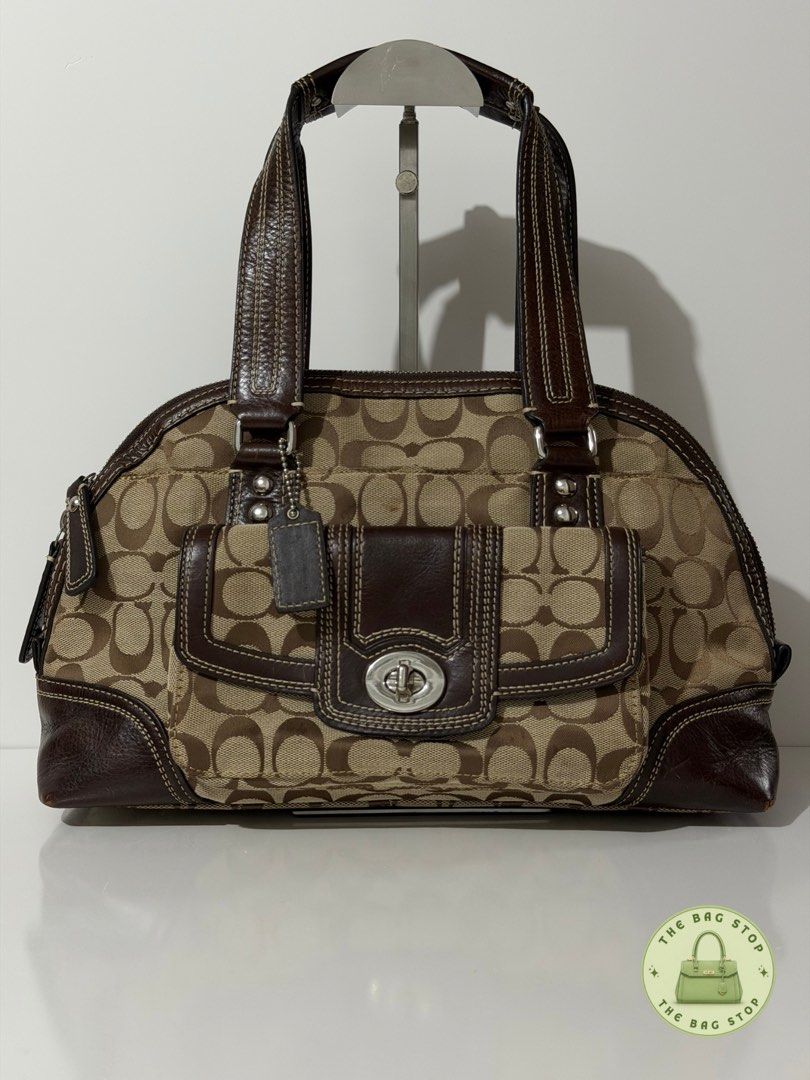 Coach Miranda Satchel (Category: Luxury Bags & Wallets) located in Imus. Submitted by thebag_stop.948 (Listing ID 1462758205, Image 1). Description: - Classic Coach monogram canvas handbag - Brown leather trim and handles - Silver hardware with front pocket turn-lock closure - Interior with multiple compartments for organization - Stylish and practical for everyday use - Great for carrying essentials.