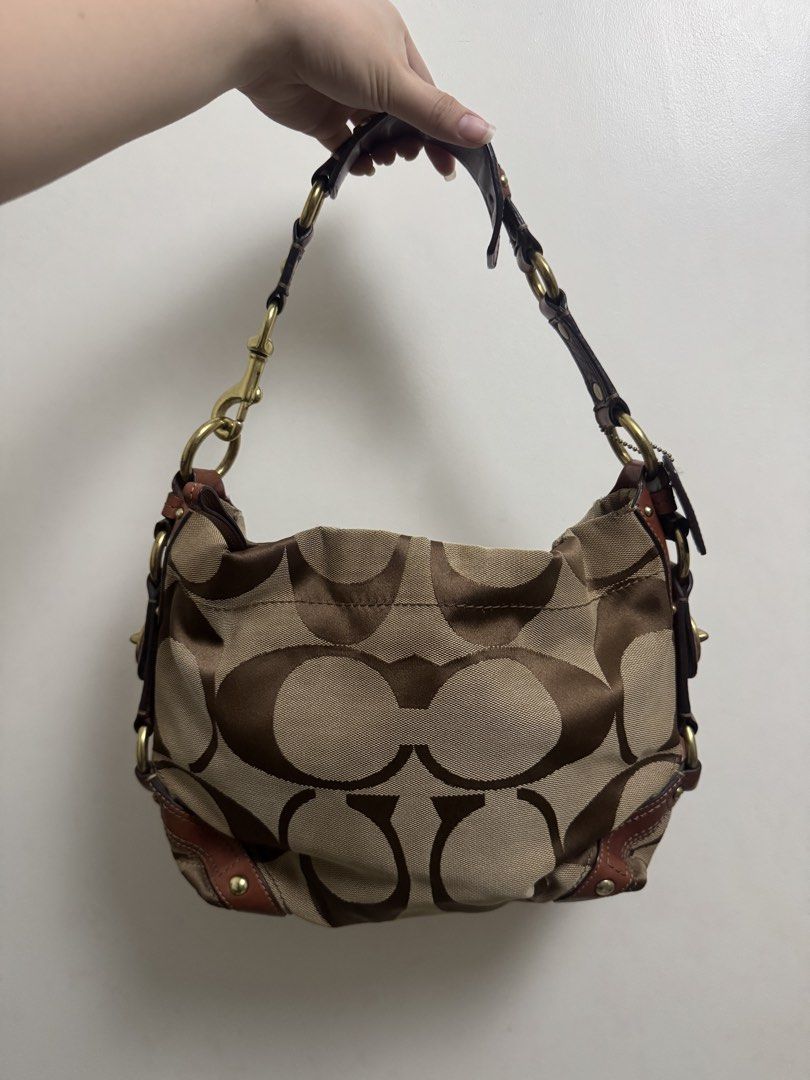 Coach Carly Medium (Category: Luxury Bags & Wallets) located in Pasig City. Submitted by sixnine52300172 (Listing ID 1462848408, Image 1). Description: - Classic Coach monogram shoulder bag - Tan and brown canvas with brown leather trim - Gold hardware details - Authentic .