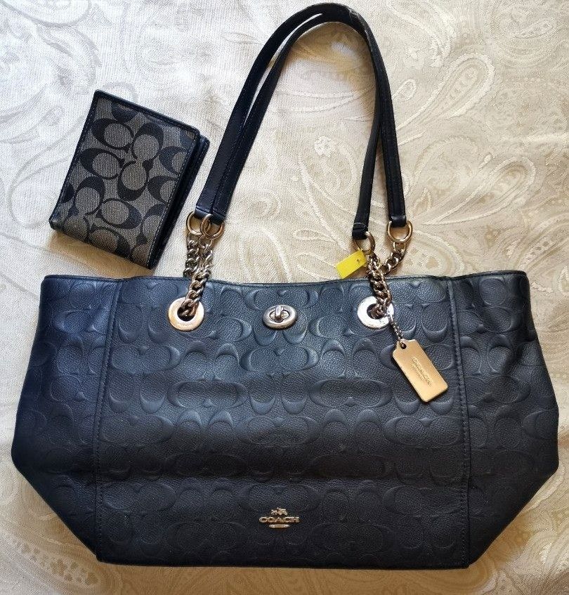 Coach Monogram Navy Blue Bag Embossed logo Shoulder Bag (Category: Luxury Bags & Wallets) located in Pagsanjan. Submitted by japan.streetwear.to.ph (Listing ID 1462765715, Image 1). Description: Coach New York Monogram Shoulder Bag Flaws: Leather Dents / Tags Embossed Monogram Excellent As Used Condition 2500php plus shipping fee.