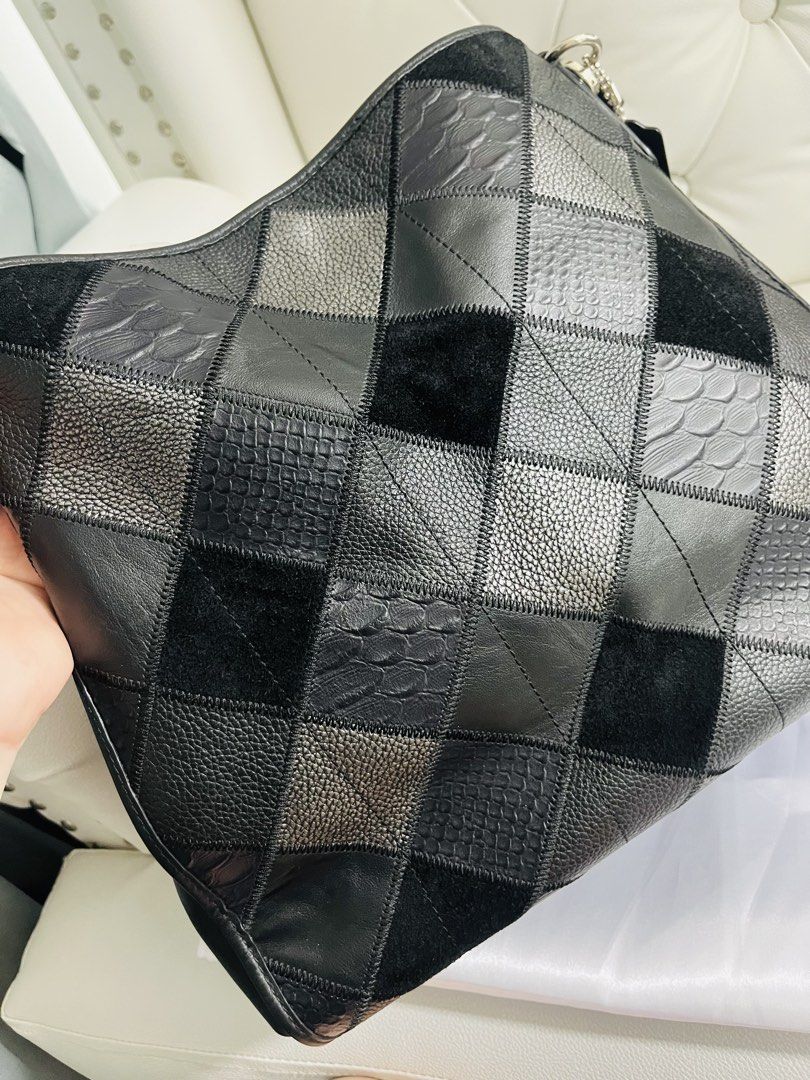 Coach New York Patchwork Leather Hobo Shoulder Bag Madison Phoebe (Category: Luxury Bags & Wallets) located in Mandaluyong City. Submitted by clairie03 (Listing ID 1462750325, Image 2). Description: - Authentic Coach New York Hobo Bag - Unique patchwork design with mixed leather textures and suede - Silver-tone hardware with Coach New York logo and horse and carriage emblem - Secure zipper closure - Comes with generic dust bag - Ideal for everyda