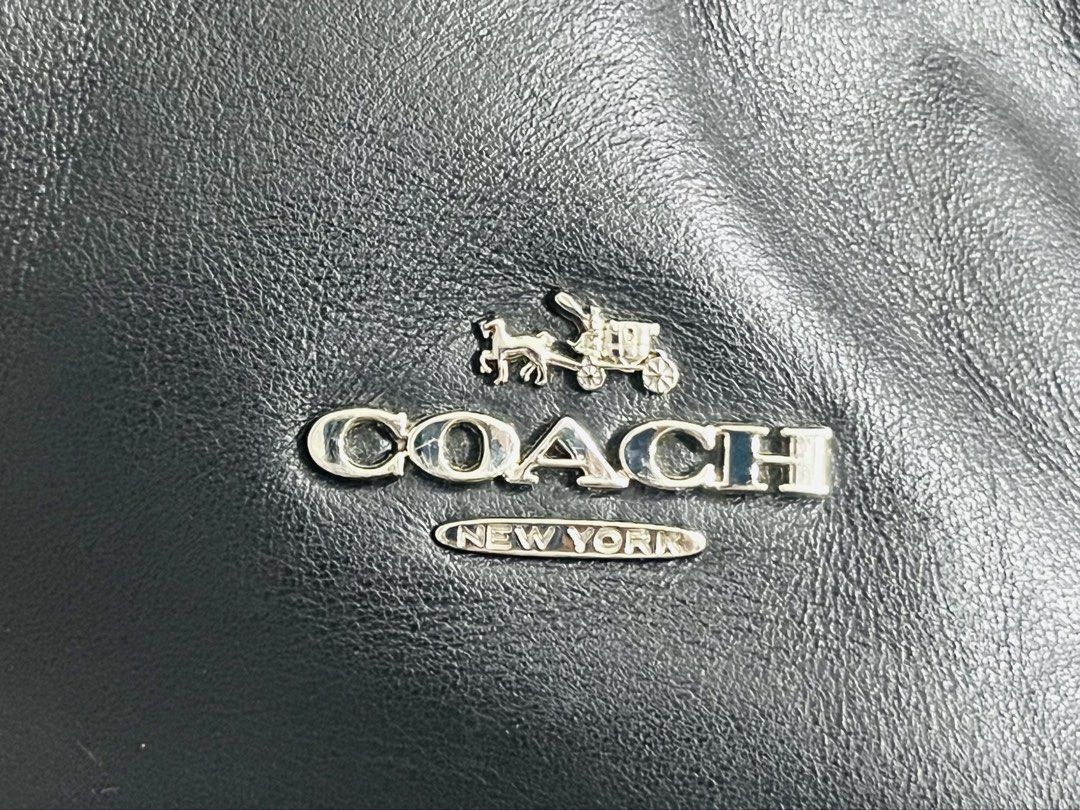 Coach New York Patchwork Leather Hobo Shoulder Bag Madison Phoebe (Category: Luxury Bags & Wallets) located in Mandaluyong City. Submitted by clairie03 (Listing ID 1462750325, Image 3). Description: - Authentic Coach New York Hobo Bag - Unique patchwork design with mixed leather textures and suede - Silver-tone hardware with Coach New York logo and horse and carriage emblem - Secure zipper closure - Comes with generic dust bag - Ideal for everyda