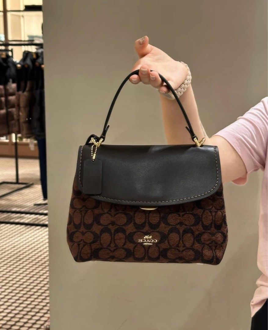 Coach satchel (Category: Cross-body Bags) located in Manila. Submitted by gff.daily_flower (Listing ID 1462700122, Image 1). Description: With tag gift receipt dustbag and paperbag.