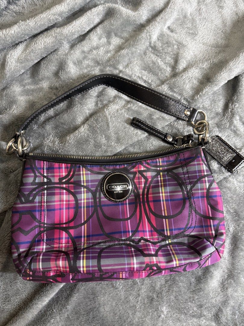 Coach Signature Plaid Bag (Category: Luxury Bags & Wallets) located in Cainta. Submitted by amswardrobe (Listing ID 1462851839, Image 1). Description: • Model / Style: Coach Poppy Tartan Plaid 2-Way Shoulder / Crossbody Bag • Style Number / Stamp: F15463 (G1049) • Materials: Canvas and leather with a fabric/nylon tartan plaid exterior and black leather handles/trim • Pattern / Color: Pink, purple, and blue tartan plaid overlaid with the signature