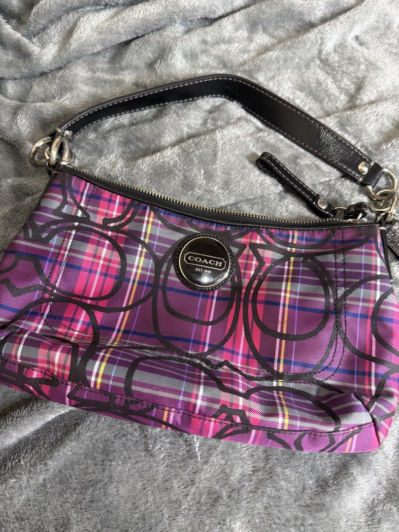 Coach Signature Plaid Bag (Category: Luxury Bags & Wallets) located in Cainta. Submitted by amswardrobe (Listing ID 1462851839, Image 3). Description: • Model / Style: Coach Poppy Tartan Plaid 2-Way Shoulder / Crossbody Bag • Style Number / Stamp: F15463 (G1049) • Materials: Canvas and leather with a fabric/nylon tartan plaid exterior and black leather handles/trim • Pattern / Color: Pink, purple, and blue tartan plaid overlaid with the signature