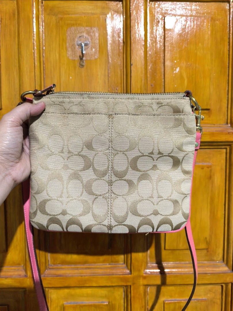 Coach sling (Category: Cross-body Bags) located in Manila. Submitted by khulet2008 (Listing ID 1462874971, Image 2). Description: C-o-A-c-H sling bag In very good condition Can fit medium size wallet, phone and kikay kit. 😅 Good for everyday use.