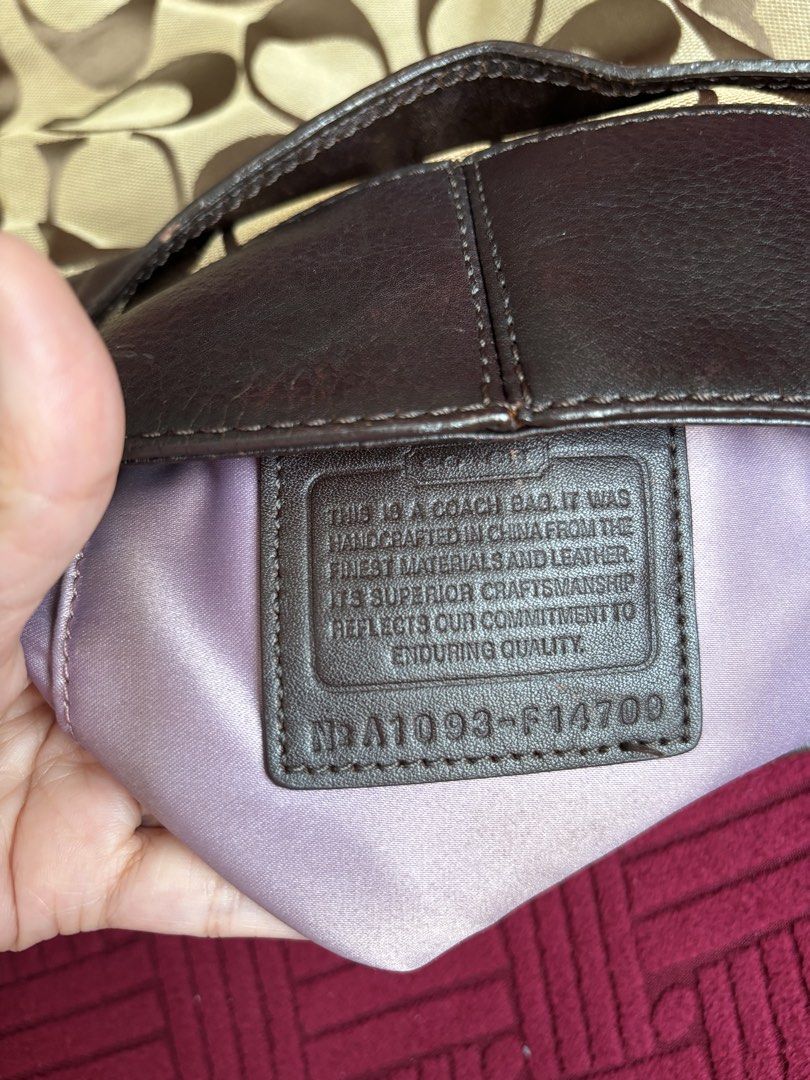 RUSH SALE Coach Zoe Large (Category: Luxury Bags & Wallets) located in Batangas. Submitted by missraee (Listing ID 1462710251, Image 2). Description: - Classic Coach hobo bag - Signature monogram canvas with dark brown leather trim - Light purple interior lining - Spacious main compartment - Silver hardware details maganda and malinis pa with extra sling. large size, ideal for everyday use. RANK AB Flaw: last photo, small tear lang sa side .