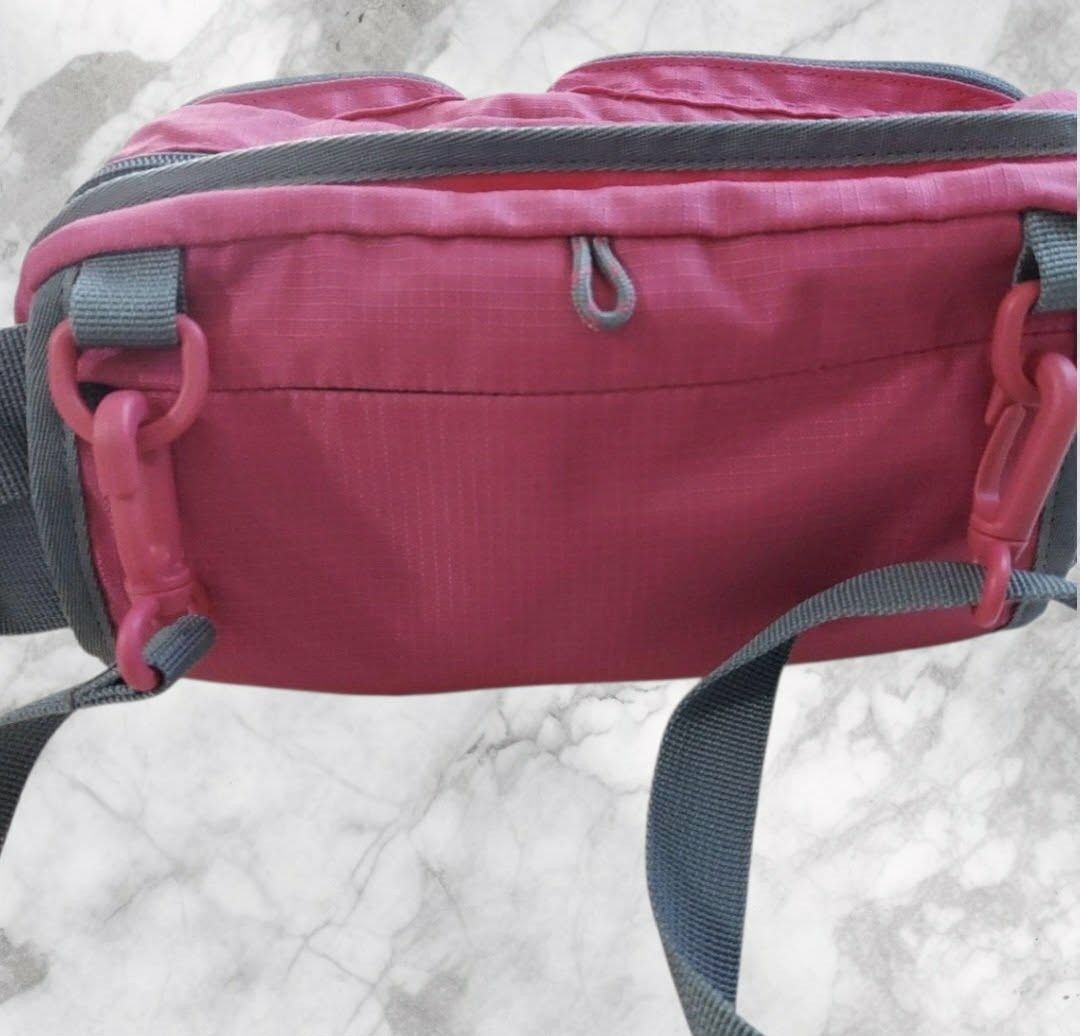 Coleman Walker Pouch (Category: Belt bags, Clutches and Pouches) located in Paranaque City. Submitted by calm_youngstore7 (Listing ID 1462813325, Image 2). Description: Coleman Walker Pouch, a highly versatile 2-way multi-pouch bag that functions as both a crossbody shoulder bag and a waist pack / hip pack. Storage: Equipped with multiple compartments, including two zippered front pocket sections for easy organization, a small horizontal reflecti