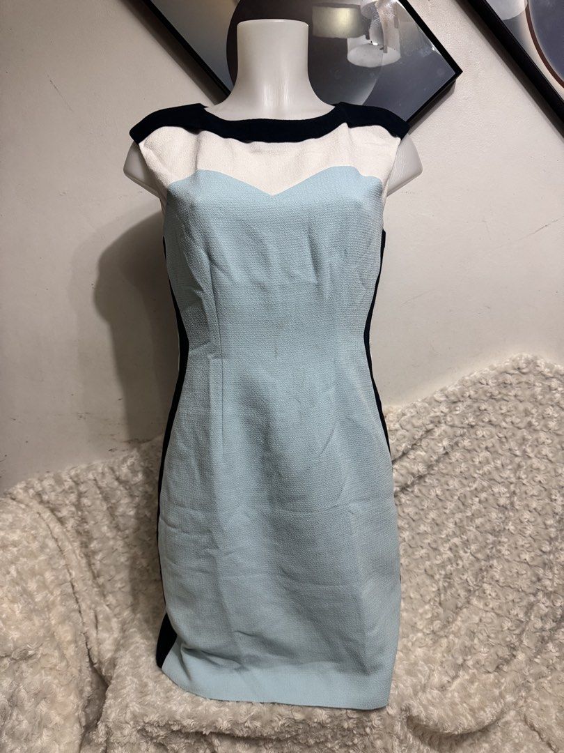 Colorblock Sleeveless Sheath Dress (Category: Dresses) located in Marikina City. Submitted by lorradel (Listing ID 1462732873, Image 1). Description: - fits S-M - Sleeveless textured dress - Colorblock design: light blue with black and white accents - Sweetheart neckline - Back zipper closure - Ideal for work or smart casual occasions - MAY HAVE some washable stains (hindi maiiwasan) needs washing; had been stored - mannequin size 34-26-34 - mann