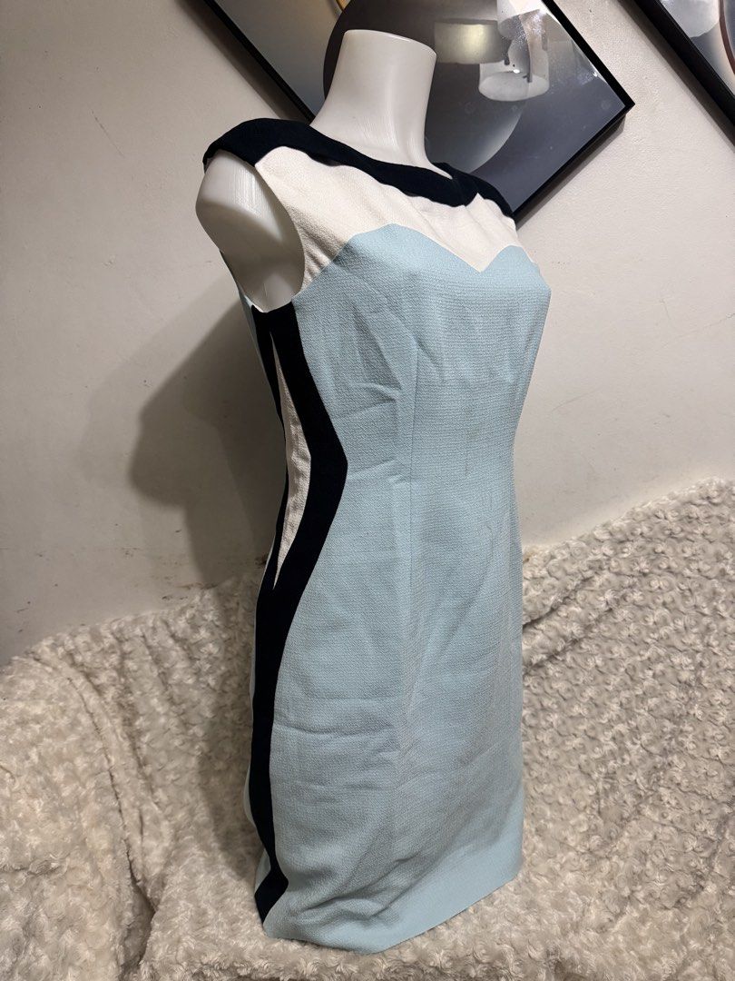 Colorblock Sleeveless Sheath Dress (Category: Dresses) located in Marikina City. Submitted by lorradel (Listing ID 1462732873, Image 2). Description: - fits S-M - Sleeveless textured dress - Colorblock design: light blue with black and white accents - Sweetheart neckline - Back zipper closure - Ideal for work or smart casual occasions - MAY HAVE some washable stains (hindi maiiwasan) needs washing; had been stored - mannequin size 34-26-34 - mann