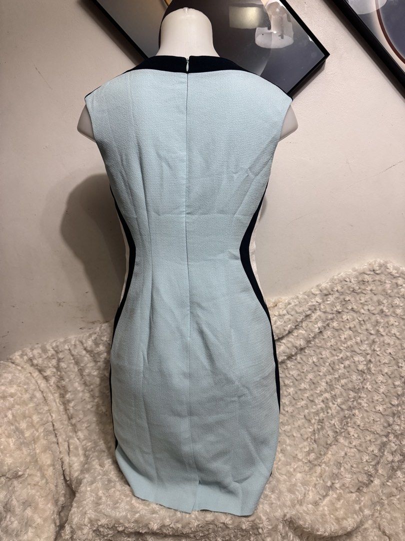 Colorblock Sleeveless Sheath Dress (Category: Dresses) located in Marikina City. Submitted by lorradel (Listing ID 1462732873, Image 3). Description: - fits S-M - Sleeveless textured dress - Colorblock design: light blue with black and white accents - Sweetheart neckline - Back zipper closure - Ideal for work or smart casual occasions - MAY HAVE some washable stains (hindi maiiwasan) needs washing; had been stored - mannequin size 34-26-34 - mann