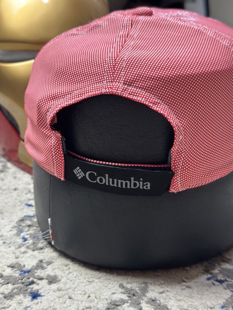 Columbia Red Running/Trekking Hat (Category: Caps & Hats) located in Daet. Submitted by thrifthings2018 (Listing ID 1462780695, Image 3). Description: - Columbia cap, perfect for running or trekking. - Stylish red color with a subtle white pattern. - Adjustable strap at the back for a customized fit. - Lightweight and comfortable for all-day wear. - Versatile for any outdoor activity or adventure..