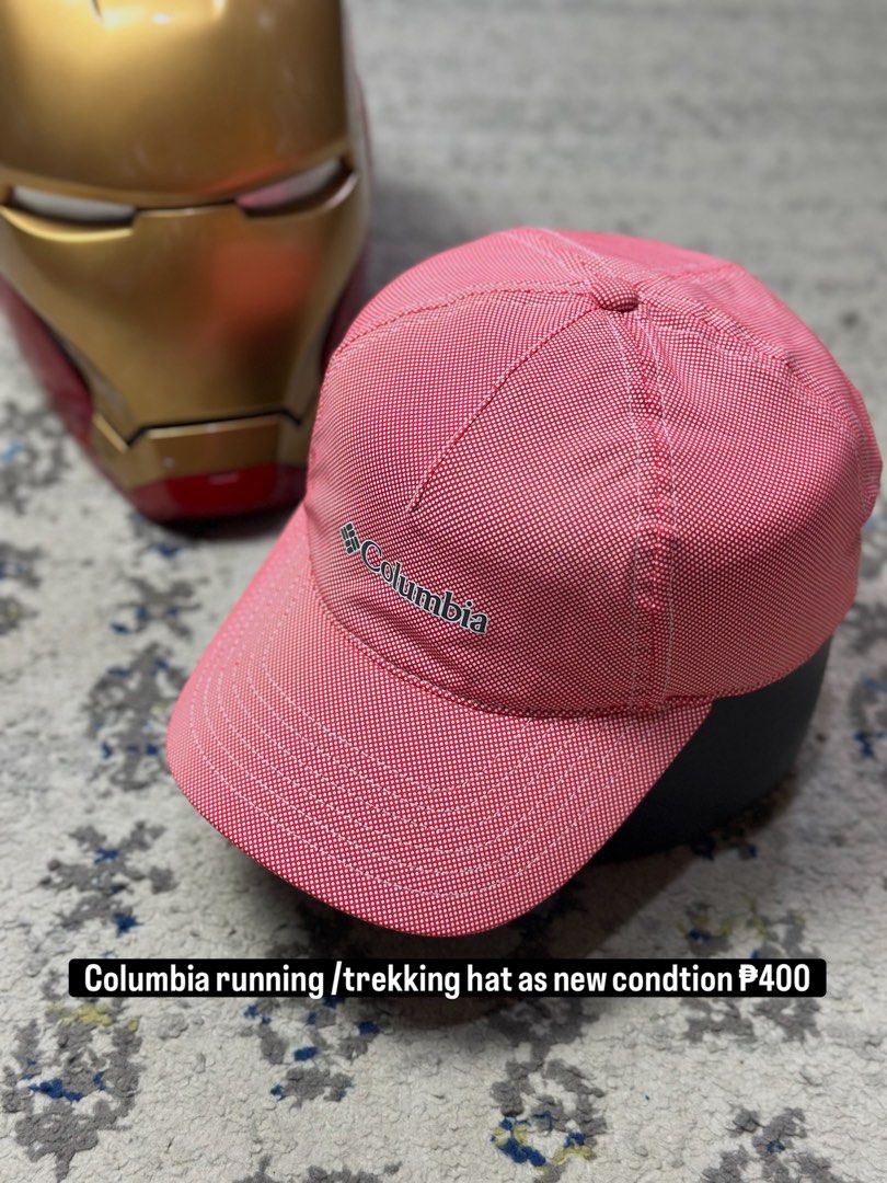 Columbia Red Running/Trekking Hat (Category: Caps & Hats) located in Daet. Submitted by thrifthings2018 (Listing ID 1462780695, Image 1). Description: - Columbia cap, perfect for running or trekking. - Stylish red color with a subtle white pattern. - Adjustable strap at the back for a customized fit. - Lightweight and comfortable for all-day wear. - Versatile for any outdoor activity or adventure..