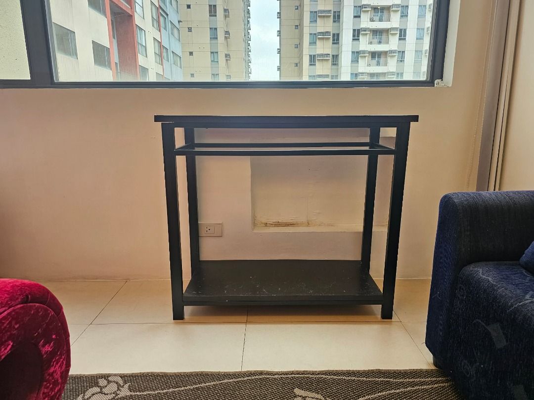 Preloved Console Table - Black (Category: Tables & Sets) located in Manila. Submitted by viaquino22 (Listing ID 1462818343, Image 2). Description: There is a small chipped/damaged area on the upper-left corner of the table (see photo). It can be repaired/refinished. Selling as-is, with the damage already reflected in the price.