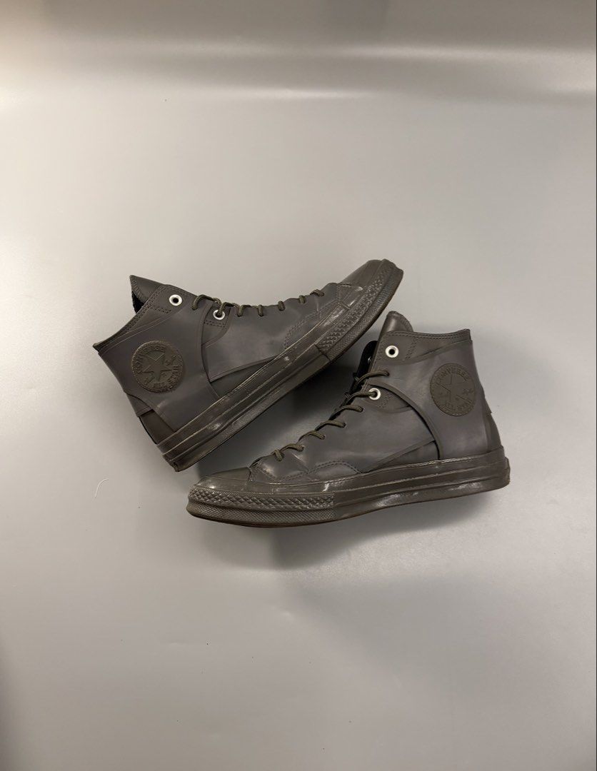 Converse Chuck 70 High Top Sneakers Dark Grey (Category: Sneakers) located in Caloocan City. Submitted by maempenafi21452 (Listing ID 1462847397, Image 1). Description: - Dark grey Converse Chuck 70 high tops - Unique layered design - Matching dark green laces - Made in Vietnam - Size: 8.5 US Men's / 10.5 US Women's.