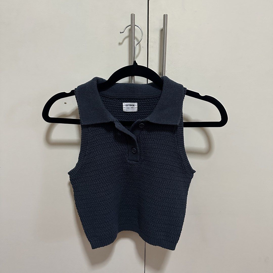 Cotton On Knitted Navy Blue Collared Sleevless Crop Top (Category: Sleeveless) located in Quezon City. Submitted by danalou (Listing ID 1462761550, Image 1). Description: - fits xs-s (size xxs on tag) - used once only - no flaws.
