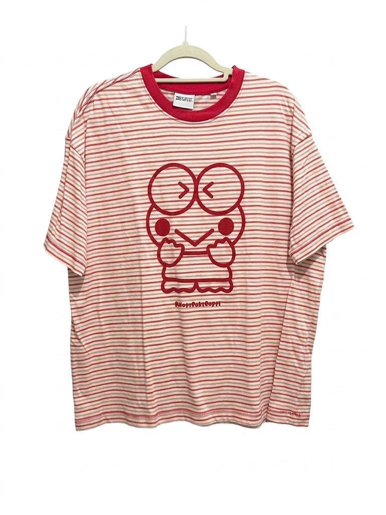 Cotton On Striped Graphic Tee M/M (Category: Shirts) located in Quezon City. Submitted by heyhaveaniceday (Listing ID 1462844890, Image 1). Description: - Cotton On graphic tee - Red and white stripe pattern - Features a cute red character graphic on the front - Boxy fit - Size: M/M - Made in Bangladesh.