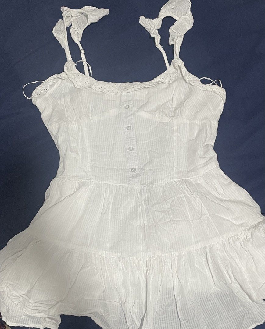 Cotton On White Mini Dress (Category: Dresses) located in Angeles City. Submitted by twinklee.555 (Listing ID 1462861103, Image 2). Description: -Matches perfectly with pants - flaw: Visible yellow stains on fabric (refer to last slide) .